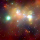 This 400 by 900 light-year mosaic of several Chandra images of the central region of our Milky Way galaxy reveals hundreds of white dwarf stars, neutron stars, and black holes bathed in an incandescent fog of multimillion-degree gas.